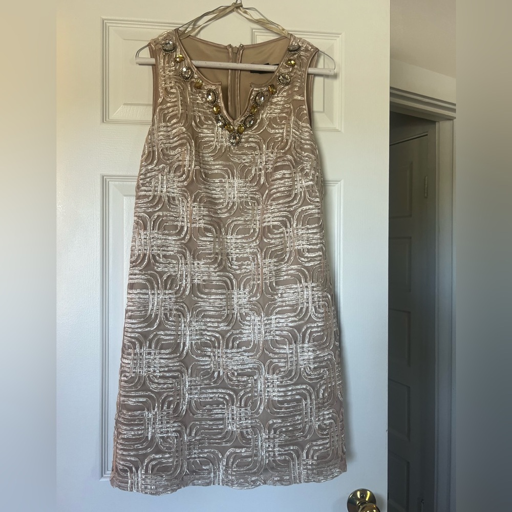 Beautiful appliqué dress. Lightweight and above the knee.